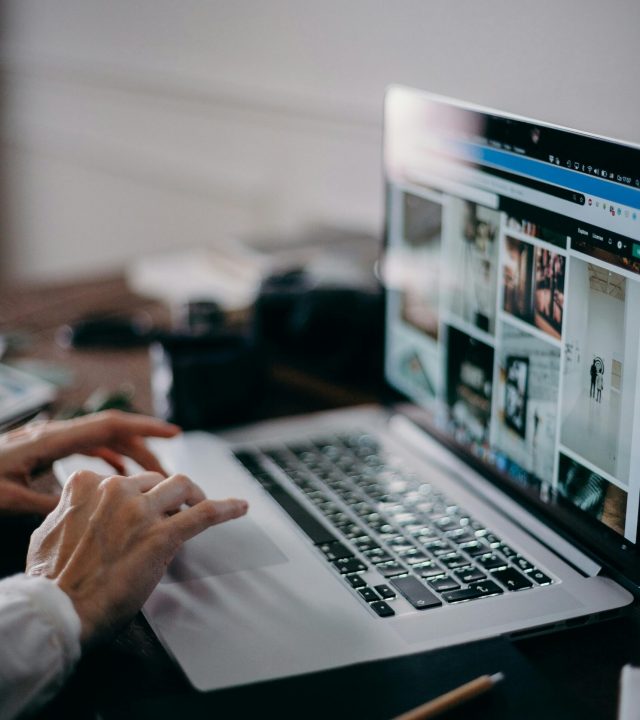 pexels-photo-3584998-3584998 A person working on a laptop browsing visual content in an indoor setting, capturing digital creativity and remote work.